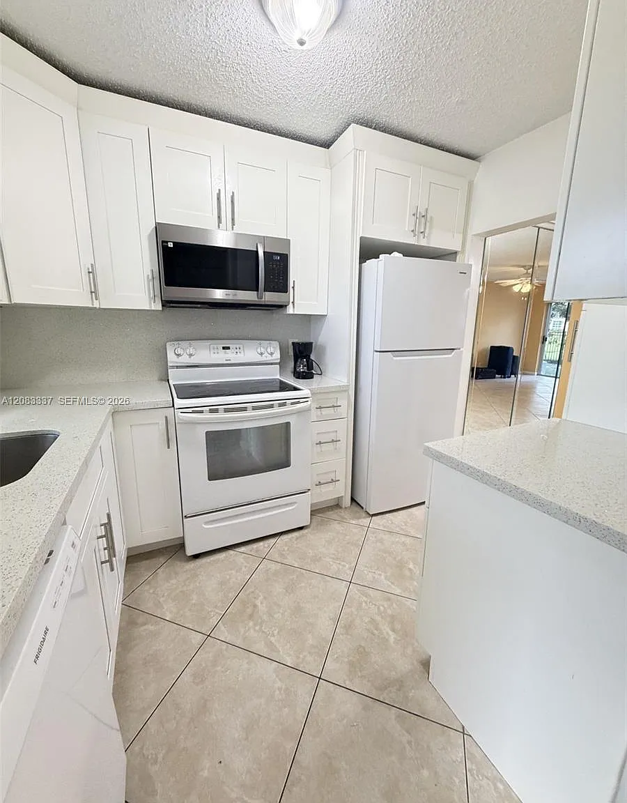 9949 Sandalfoot Blvd — Photo 2