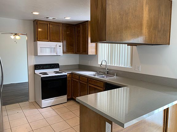 Kitchen with gas stove/oven and microwave