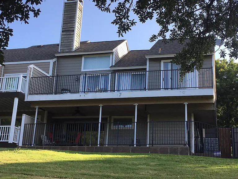 View of Balcony and patio area of home.
