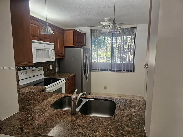 8592 W Sunrise Blvd #209 — Photo 4