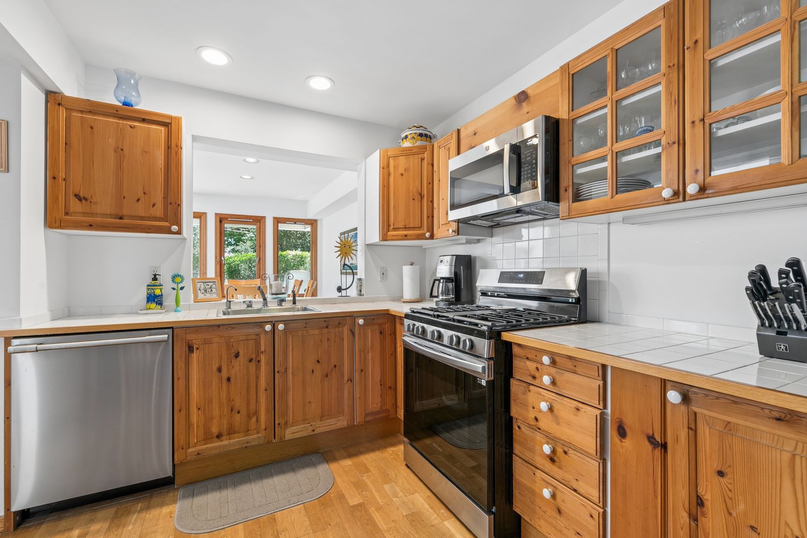 Kitchen with pass through to dining area