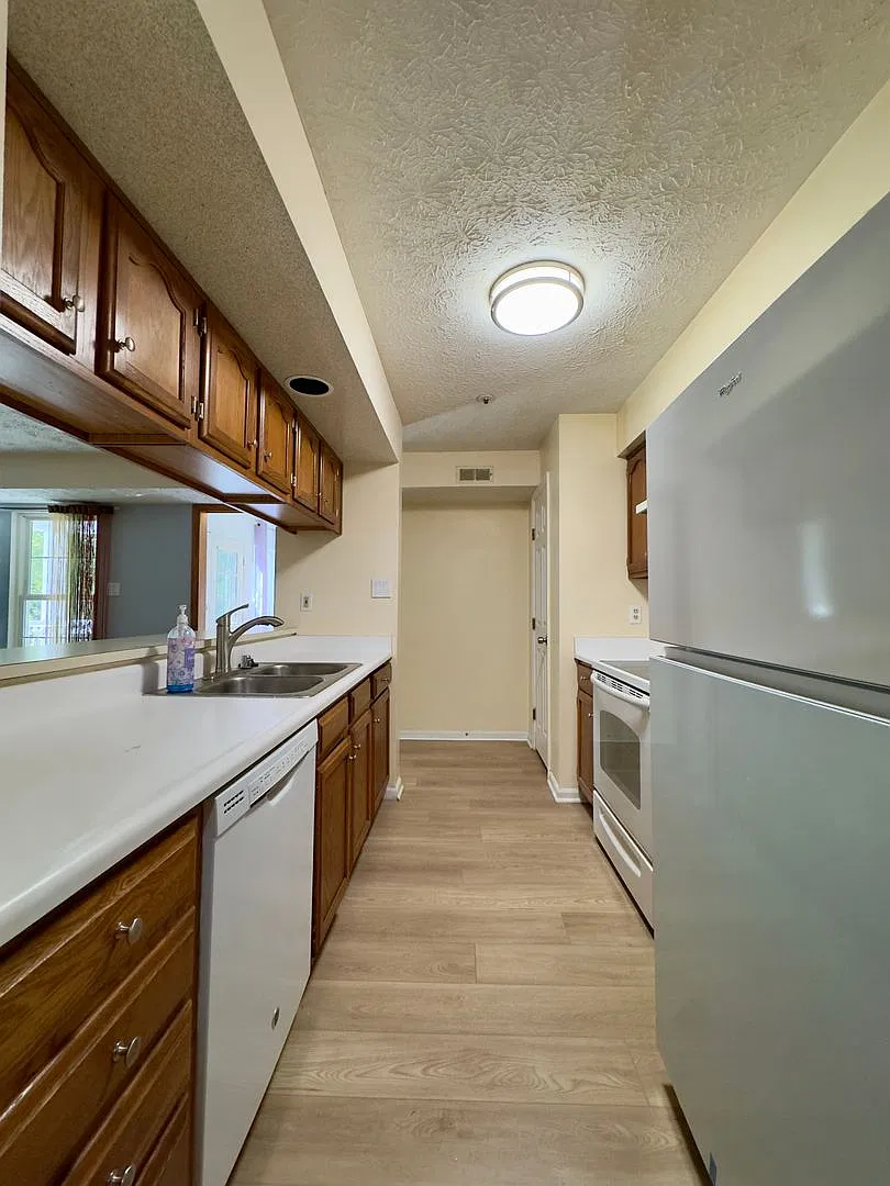 Spacious 2BD/1BA Condo with Sunroom & Private Balcony in Pikesville, MD! — Photo 4