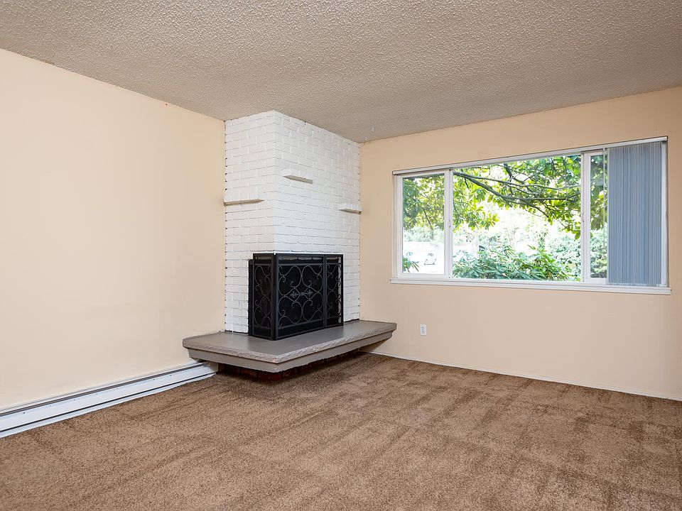 Woodiside Vista ; Living Room with Wood Burning Fireplace