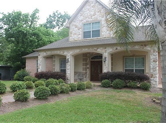 Beautiful covered front porch . Home offers luxurious finishes throughout with a versatile and functional floor plan.