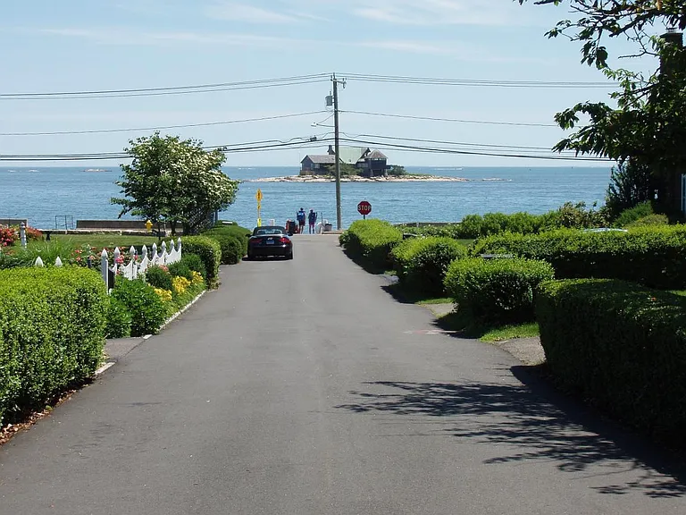 Looking down the street to water.