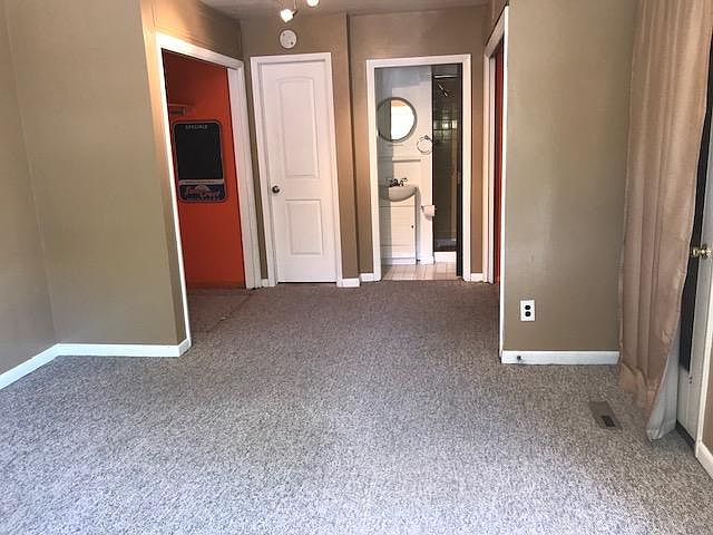 Showing closet and bath