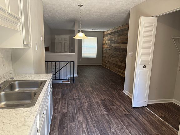 Beautifully remodeled kitchen with new sleek countertops