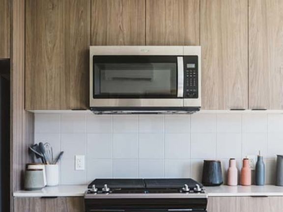 Close up of stainless steel appliances in kitchen