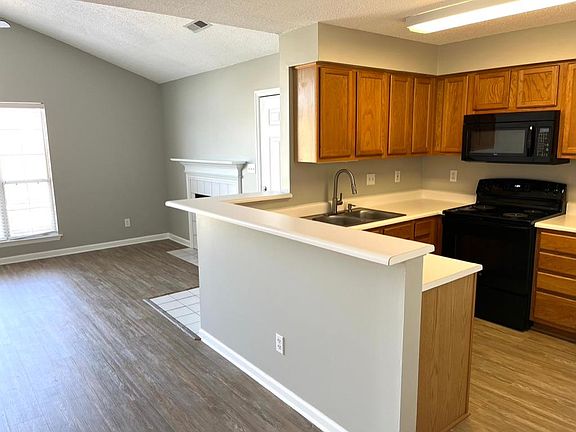 View of Kitchen and Living Room
