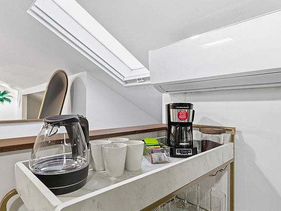 Cozy coffee and tea corner in the studio, complete with a coffee station _perfect for enjoying your morning brew or a quiet beverage any time of day.