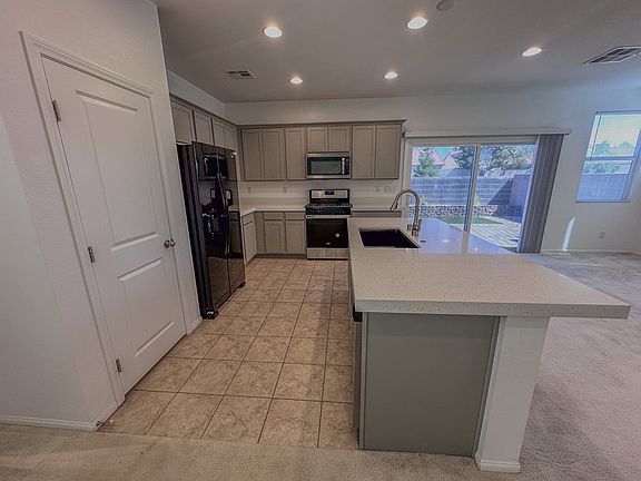 3rd image of 1042 Solemn Cactus Ave