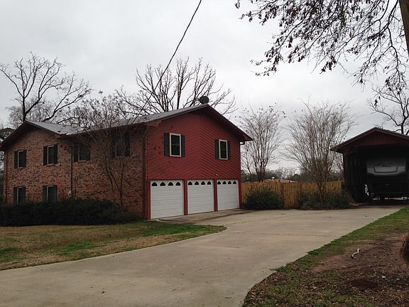 Rear with concrete driveway