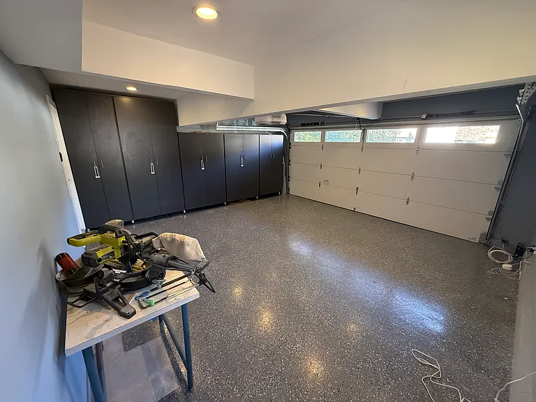 Garage - plentiful wall-to-wall storage
