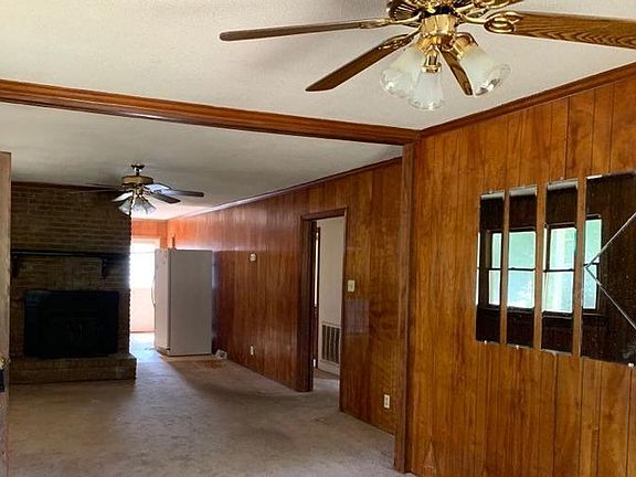 View from main living area to fireplace and kitche