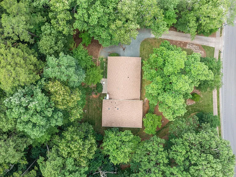Large yard with mature trees