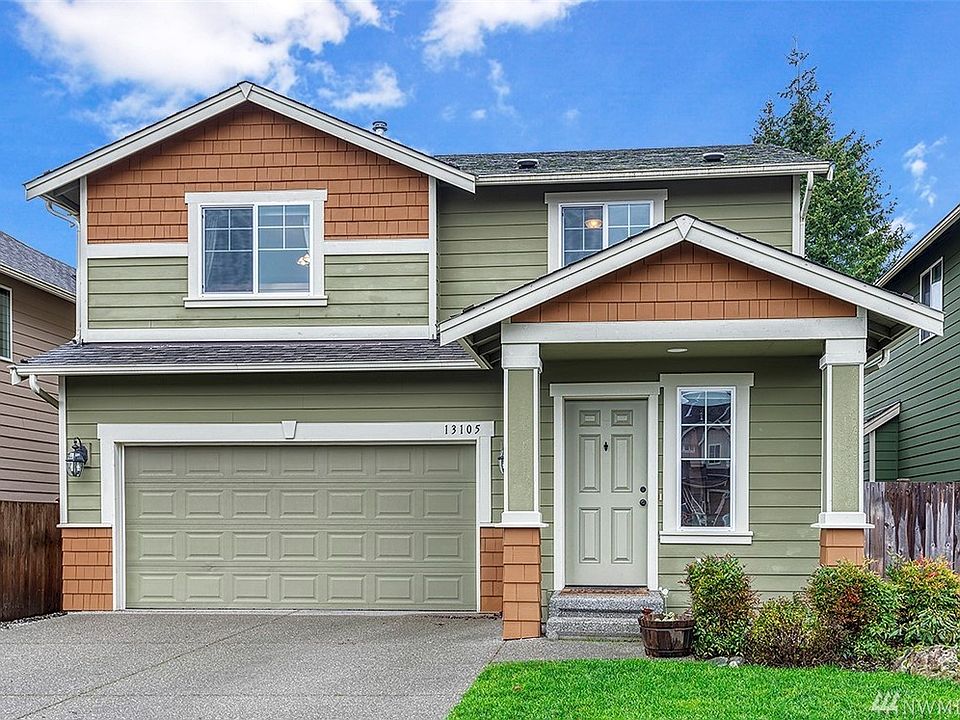 Located on a cul-de-sac, freshly painted shingles and Hardiplank cement composite siding.