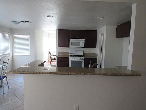 4th image of 9833 Smoketree Ct
