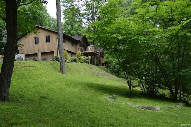 Contemporary home on private wooded setting.