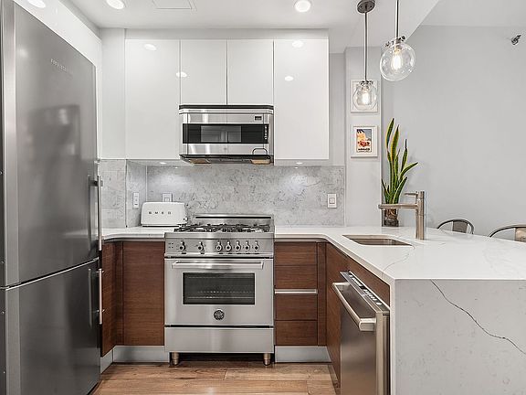 5th image of 11-35 45th Ave #2E