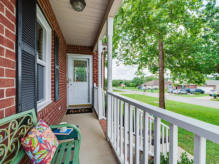 Welcoming front porch -great for morning coffee or great sunset watching