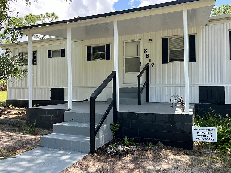 3817 North Holiday Drive, 2 Bedroom, 2 Bath spacious double-wide featuring a large kitchen /dining area, new wall oven, new refrigerator, kitchen island. Central heat and air. Washer and dryer in unit.
