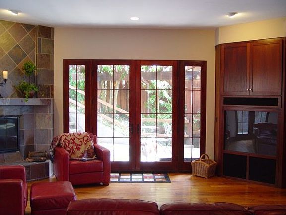 Warm and inviting family room with custom built-in cabinets