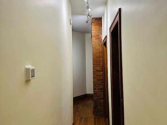 The hallway leads you to your bedroom, the bathroom and the kitchen.