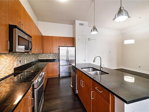 2nd image of 711 Cosmopolitan Dr NE