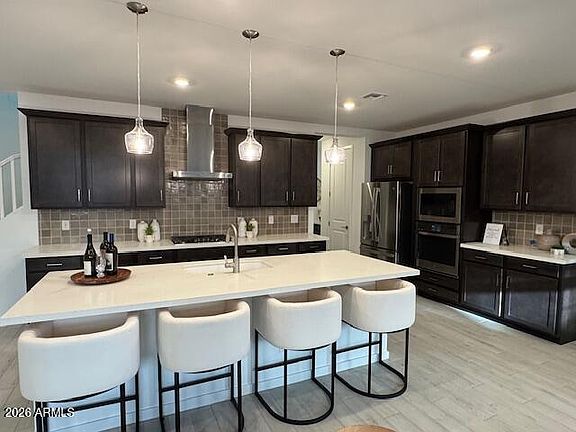 3rd image of 2460 W ROWEL Road