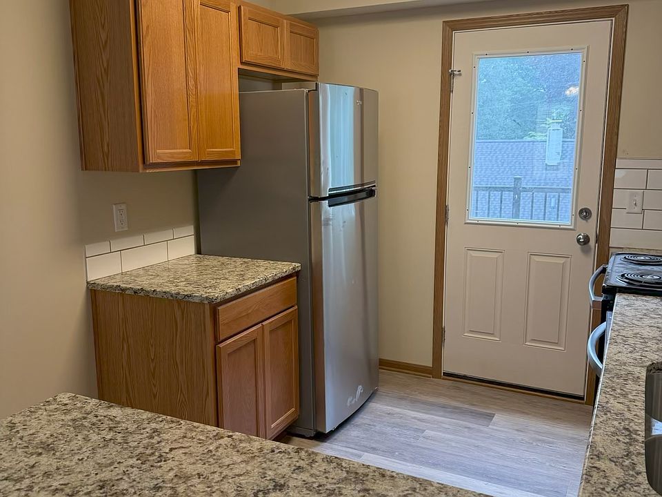 Kitchen that leads to a Deck