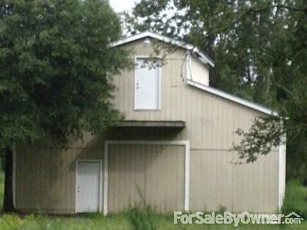 Barn/workshop
						:
						has concrete floors, wired 110 /220, water, rough plumbing for bathrm