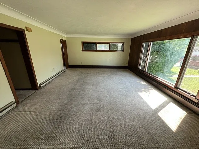 Wide view of 200 X 50 foot Living room from Fireplace.