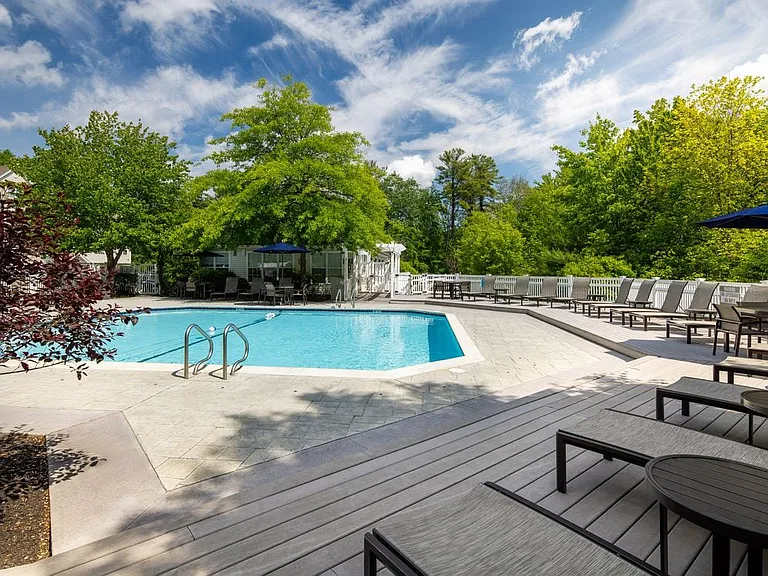eaves Wilmington pool with lounge seating