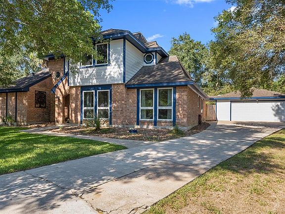 Charming home in Ravensway on large lot with sparkling salt water pool in very private backyard.