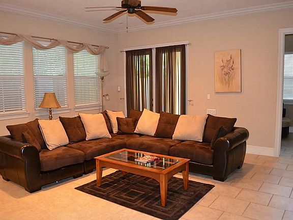 Gorgeous den area with beautiful windows.