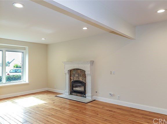 Living room also offers gas fireplace with remote starter and beautiful mantle & hearth. Scraped cei