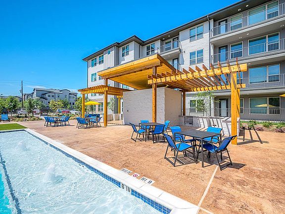 view of pool with a pergola