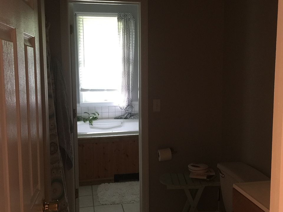 Full bath with shower and jacuzzi