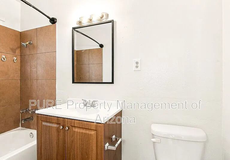 1251 E Rose Ln — Photo 17