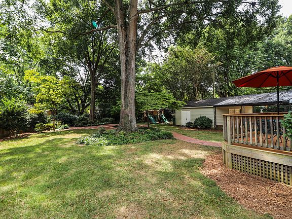 Mature trees w/brick patio