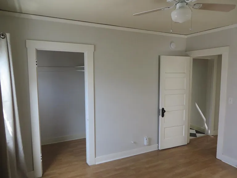 Bedroom with walk-in closet in bedroom