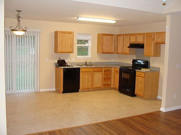Spacious kitchen open to dining room.