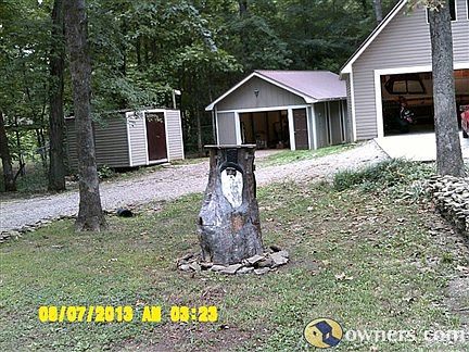 3 detached out buildings