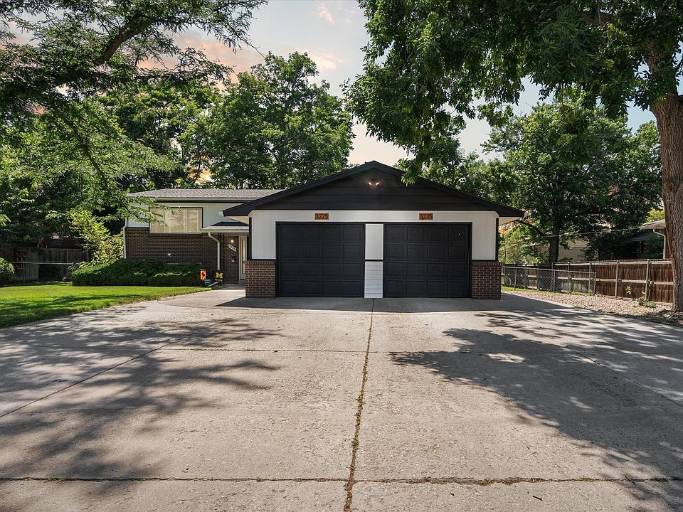 Welcome to 3235 Pierce St! This half duplex has been updated and meticulously maintained. You get the garage space on the right, as well as the driveway spaces in front and to the right.
