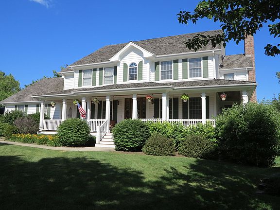 Side porch has French door entry to study.