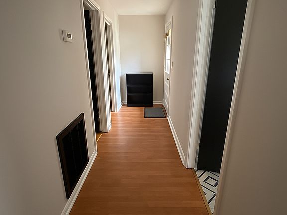 Hall way 
-Door to Exit House to Private Fenced Courtyard (Door 1 Right)
-Master Bedroom (Door 1 Left)
-Main Bathroom Entrance (Door 2 Right)
-2nd Bedroom (Door 2 Left)