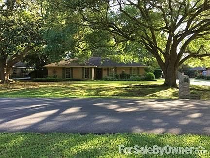 Front
						:
						Beautiful Oaks shade entire front yard
