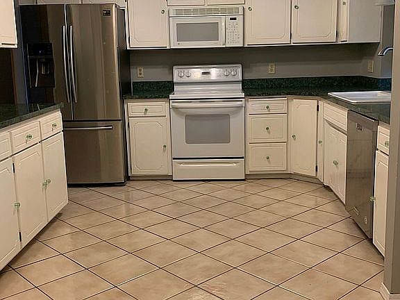 Kitchen with new refrigerato