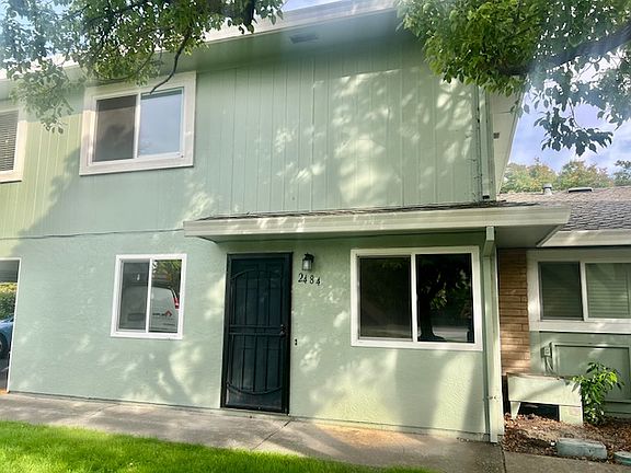 Entrance that is close to the carport, laundry room and storage closet