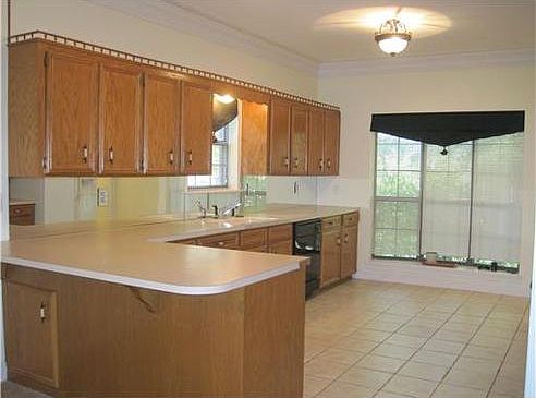 Large Kitchen with Tons of Counter Top and Cabinet Space